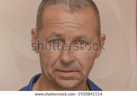 Portrait of man with crooked nose. Man with tram nasal septum close-up. Royalty-Free Stock Photo #1920841514