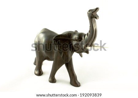 figure wooden elephant on white background