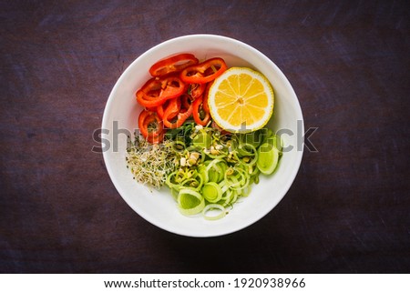 Vegan, detox green Buddha bowl recipe. organic raw fresh various microgreens for healthy salad, sprouted green cereals for healthy food concept. Food and health. Superfood food. Top view, flat lay.