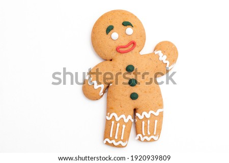 Gingerbread cookie classic decorated on white background Royalty-Free Stock Photo #1920939809