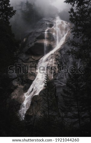 Shannon Falls in a very foggy day. The fog came down to the waterfall creating and beautiful mood and depth to the picture. Shannon Falls is the third highest waterfall in British Columbia