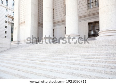 The exterior of a municipal or government building or courthouse. Royalty-Free Stock Photo #1921080911