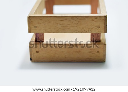Selective Focus of A Wooden Box for Toys Isolated with White Background 