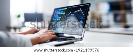 KPI Business Analytics Dashboard On Laptop Computer Royalty-Free Stock Photo #1921199576
