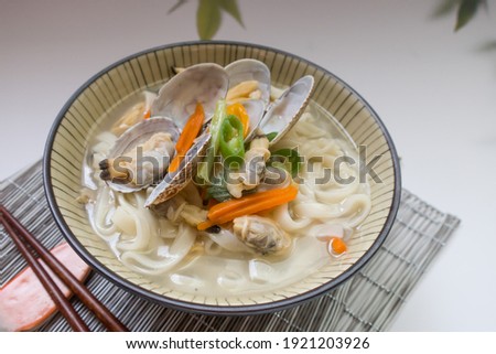handmade chopped noodles with calm and vegetable Royalty-Free Stock Photo #1921203926