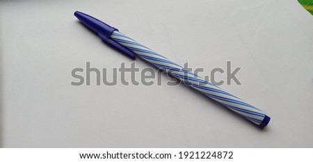 Blue Pen on white background