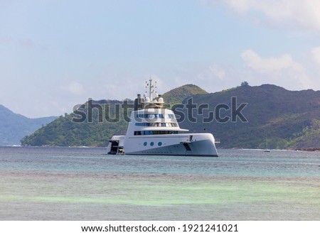 Expensive Russian stealth luxury super yacht moored off Curieuse island in the Seychelles
