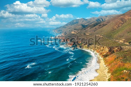 Aerial view from a drone, beautiful coastal landscape on Pacific Highway 1, traveling south to Los Angeles, Big Sur, California. Concept, vacation, tourism Royalty-Free Stock Photo #1921254260