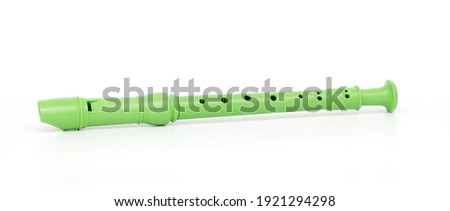 Green block flute isolated on white background Royalty-Free Stock Photo #1921294298