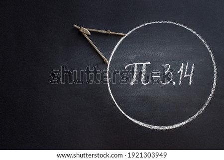 The Greek letter Pi, the ratio of the circumference of a circle to its diameter, is drawn in chalk on a black chalkboard with a compass in honor of the international number Pi for March 14 Royalty-Free Stock Photo #1921303949