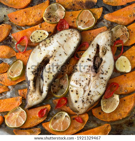 baked halibut steaks with lime and sweet potato close-up