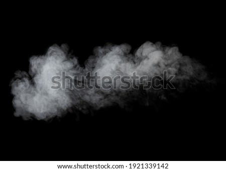 White cloud of smoke or steam isolated on black background. Royalty-Free Stock Photo #1921339142