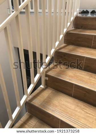 Picture of wooden textured stair of the house 