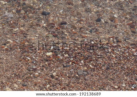 Sandy beach with clear sea water background