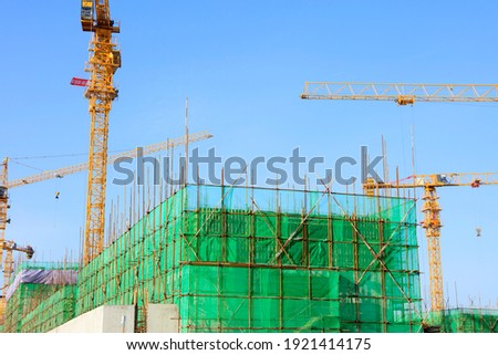 The construction site, the construction worker's tower crane, Residential buildings are under construction
