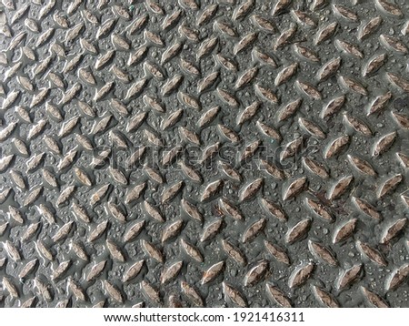 Industrial metal checkered plate or anti-slip  surface with rainwater 
