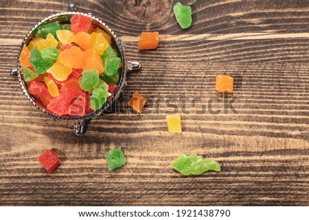 Colorful candies on a plate. Top view.