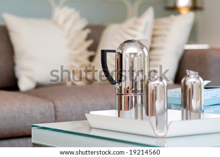 Tea pot on the coffee table in the living room Royalty-Free Stock Photo #19214560