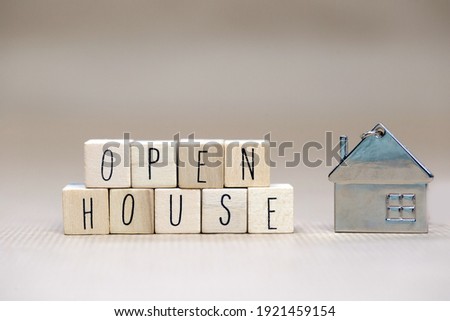 open house sign text wooden cubes, real estate, mortgage,business and sale concept background with symbol of house