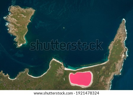 Middle island, lake Hillier a saline lake, Recherche Archipelago. Satellite view of the Australian west coast. Nature and aerial view.  Element of this image is furnished by Nasa Royalty-Free Stock Photo #1921478324