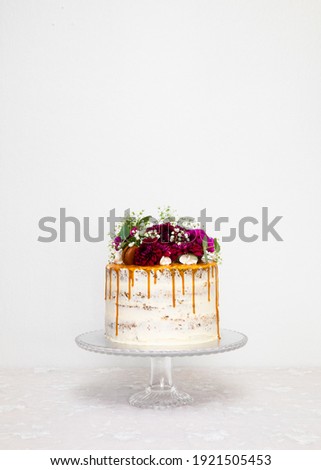 Cake photos wedding drip with cake topper carrot cake