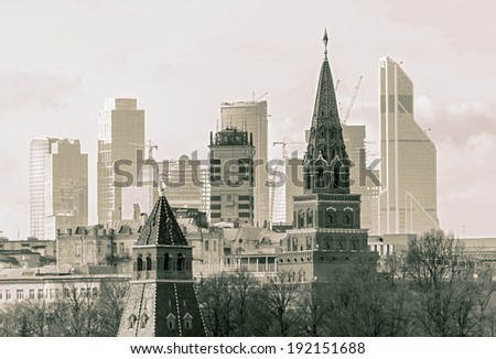 Moscow Kremlin on the modern building background, Russian Federation (stylized retro)