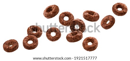 Falling chocolate corn rings isolated on white background with clipping path Royalty-Free Stock Photo #1921517777
