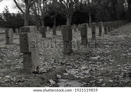 Black and white photo of a German war grave to commemorate the fallen soldiers of World War II