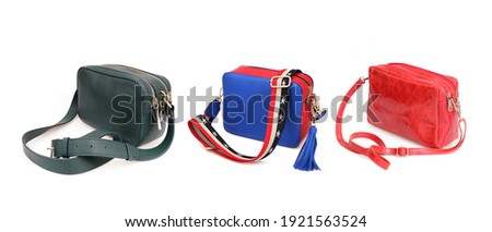 Elegant various cross body bags isolated on white background Royalty-Free Stock Photo #1921563524