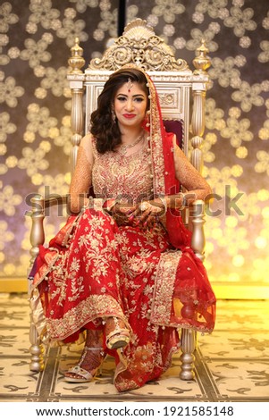 Beautiful Indian Bride sitting on his wedding chair