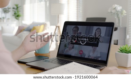Back rear view young asian woman employee work from home using computer notebook videocall meeting conference angry annoy with low poor unreliable internet wifi connection problem issue outage. Royalty-Free Stock Photo #1921600064