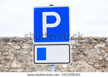 parking sign in scenery town in Europe.