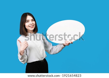 Asian woman showing empty board for input your text