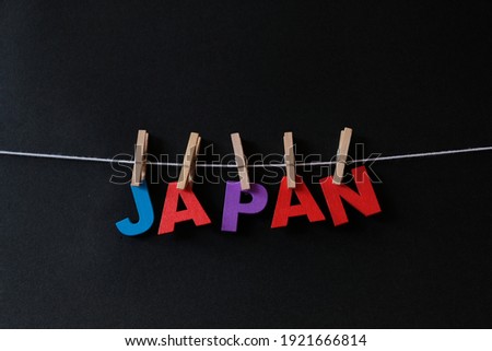 Word Japan on black background. Japan is an island country in East Asia, located in the northwest Pacific Ocean and the eleventh-most populous country in the world.