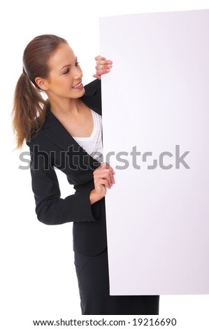 Beautiful business woman holding empty white board