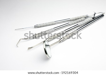 Set of metal Dentist 's medical equipment tools on tray  Royalty-Free Stock Photo #192169304