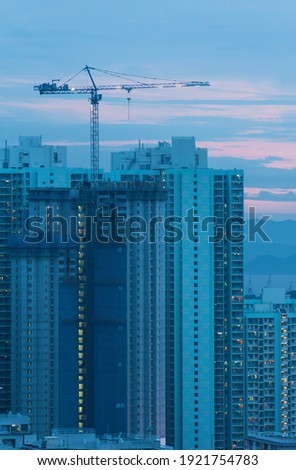 Construction site in Hong Kong city at dusk