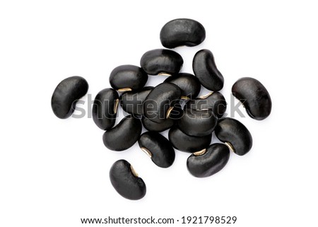 Black beans (Urad dal, black gram, vigna mungo) isolated on white background. Top view. Flat lay.  Royalty-Free Stock Photo #1921798529