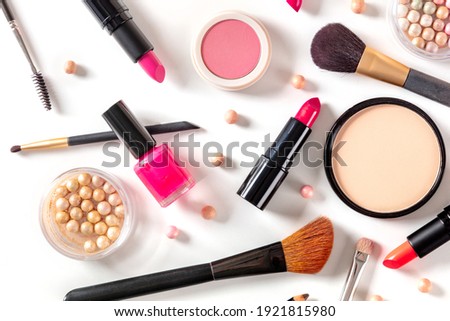 Make-up products, shot from the top on a white background. Various cosmetics Royalty-Free Stock Photo #1921815980