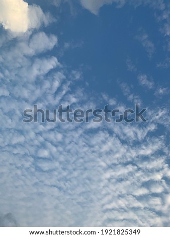 The blue sky and the large white stratocumulus clouds fill the beautiful sky at Thailand.no focus