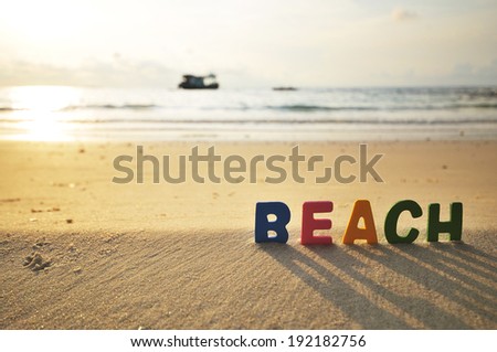 Beach, Colorful wooden text on the beach