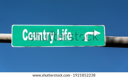 Street Sign the Direction Way to  Country Life