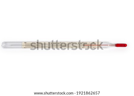 Laboratory alcohol glass thermometer with red dye and Celsius units scale on a white backround, top view
 Royalty-Free Stock Photo #1921862657