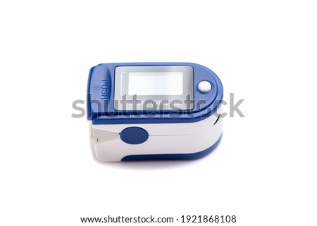 Portable blue Pulse Oximeter on isolated white background with clipping path to monitor oxygen level at home. Covid-19, healthcare concept. Pulse Rate Health Tester is used to measure air in lungs.