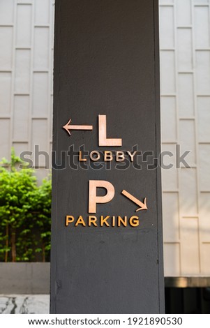 Direction Sign, Hotel Lobby Registration Sign and Parking lot sign in the Hotel Area.