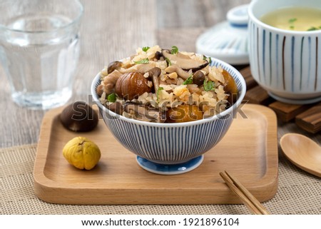 Delicious Japanese chestnut and chicken with shimeji seasoned mixed rice, also known as takikomi gohan. Royalty-Free Stock Photo #1921896104