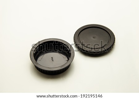 End cap and lens cap off the camera. To prevent dust from various
