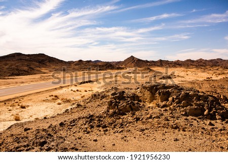 Beautiful landscape of sand dunes in Egypt. Sahara Desert. Background of orange sand wave. Africa desert