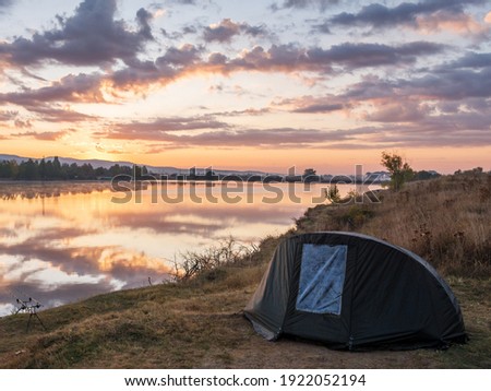 Picture of a tent in the middle of nature