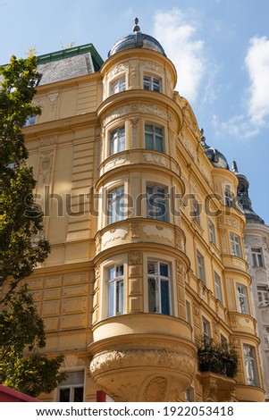 A beautiful yellow building with a bay window.Vienna, Austria